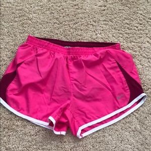 Pink Nike running shorts